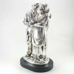 Escultura de una pareja mayor en plata bilaminada. Personalizada.