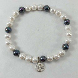 Pulsera de perlas blancas y azules de fantasía con estela de Cantabria