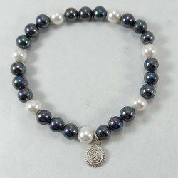 Pulsera de perlas blancas y azules de fantasía con estela de Cantabria