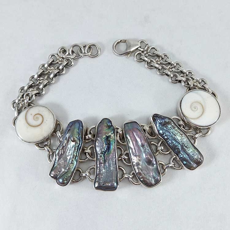 Pulsera de plata de ley 925 decorada con diversas conchas marinas