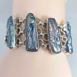 Pulsera de plata de ley 925 decorada con diversas conchas marinas