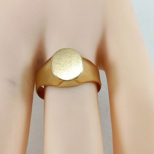 Anillo sello ovalado liso de niño en oro de ley de 18 quilates